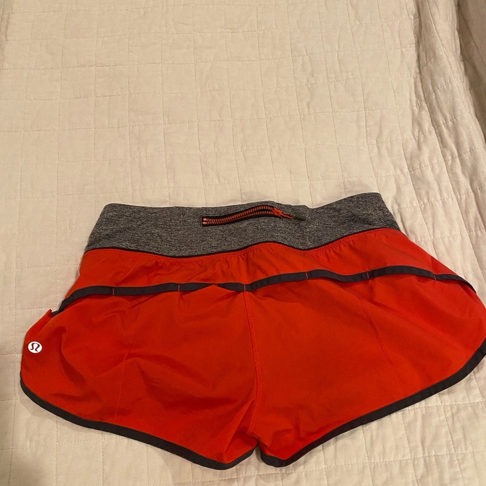 Lululemon speed shorts.  Size 4.  Red.  Length 2.5”.
